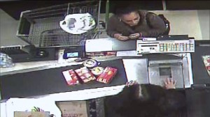 Store surveillance video showed Maria Elena Rivas checking out with her groceries on Dec. 22, 2014.