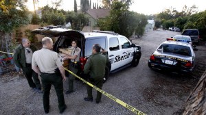 Ventura County deputies set up a command post at Dent Ranch in rural Moorpark, where authorities are investigating an incident in which a woman was allegedly doused with gasoline and set on fire. (Credit: Los Angeles Times)