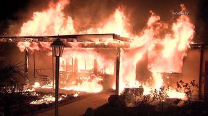 Flames tore through a home in North Hollywood on Jan. 6, 2015. (Credit: OnScene.TV)