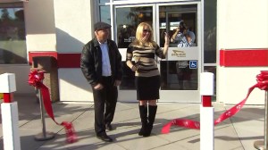 In-N-Out Burger owner Lynsi Snyder cuts the ribbon at the opening of a new restaurant in Anaheim on Wednesday, Jan. 7, 2015.  