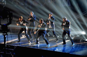 A reunited 'N Sync including Justin Timberlake (C), JC Chasez (L), Lance Bass (2nd L), Joey Fatone (2nd R), and Chris Kirkpatrick (R) at the MTV Video Music Awards August 25, 2013 at the Barclays Center in New York. (Credit: Stan Honda/AFP/Getty Images)