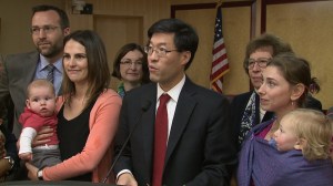 State Sen. Dr. Richard Pan stands with supporters as he introduces a vaccine-related bill in Sacramento on Feb. 4, 2015. (Credit: KTXL)