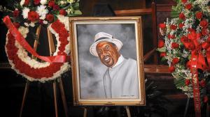 Nearly 2,000 mourners gathered Saturday at First AME Church in South Los Angeles for the funeral of Terry Carter. Marion "Suge" Knight is charged in his death. (Barbara Davidson/Los Angeles Times)