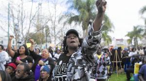 Linda Jay joins hundreds of protesters to rally against police abuse and to remember Ezell Ford, a mentally ill black man killed by LAPD officers, in Leimert Park on Feb. 21, 2015. (Credit: Gina Ferazzi/Los Angeles Times)