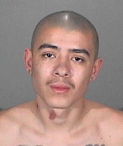 Louis Vasquez is seen in a booking photo. (Credit: Covina Police Department)