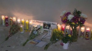 A memorial for Philomene Ragni was established near his high school in Granada Hills on Feb. 19, 2015. He was fatally struck by a truck while riding a bicycle the previous day. (Credit: KTLA)