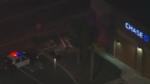 Police responded to a shopping plaza in Fullerton, where a suspicious device was found near a bank on Friday, Feb. 13, 2015. (Credit: KTLA)