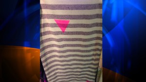 The Anti-Defamation League says a tapestry embellished with a pink triangle, sold in Urban Outfitters stores, looks like uniforms that prisoners were forced to wear during the Holocaust. The group has asked the retailer to pull the product. (Credit: Anti-Defamation League via CNN Wire)