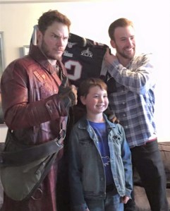 Marvel stars Chris Pratt, left, and Chris Evans, right, pose with a child at a Boston children's hospital on Feb. 6, 2015. The photo was tweeted by the Seahawks and distributed through the CNN Wire. 