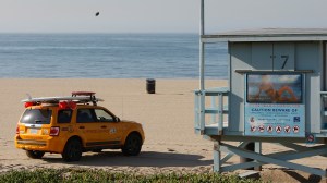 A lifeguard patrols Will Rogers State Beach on March 11, 2011, in Pacific Palisades. (Credit: David McNew/Getty Images)