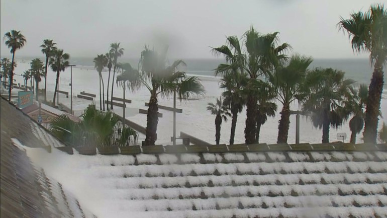Up to an 1/2 inch of hail fell on Huntington Beach on March 2, 2015, according to the National Weather Service. (Credit: KTLA)