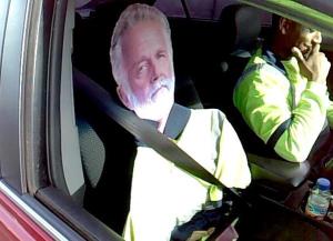 A Washington state trooper photographed the laughing driver and his "passenger" during a traffic stop outside Tacoma. (Credit: (Washington State Patrol)