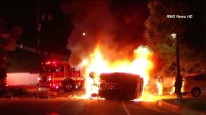 Street racing led to a fiery crash in Beverly Crest on Saturday, March 28, 2015, police said. (Credit: RMG News)