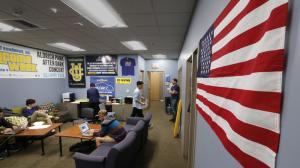 The American flag has been rehung on the wall of the UC Irvine student government center days after a student government decision to ban all flags from this office set off a firestorm of protests from students and the public. The ban was vetoed March 7, 2015. (Credit: Don Bartletti / Los Angeles Times)