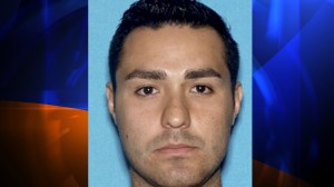 Henry Solis, a probationary officer with the Los Angeles Police Department, was named a "person of interest" in connection with a fatal shooting in Pomona on March 13, 2015. (Credit: Pomona Police Department) 