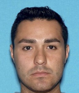 Henry Solis, a probationary officer with the LAPD, is shown in a photo provided by the Pomona Police Department.