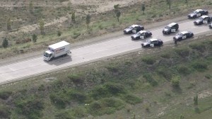 A pursuit that lasted more than an hour came to a stop on the transition road from the eastbound 210 Freeway to the northbound 15 Freeway on March 3, 2015. (Credit: KTLA)