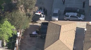 Police were at the scene of a fatal stabbing near the intersection of Kester Avenue and Lemay Street in Van Nuys on March 24, 2015. (Credit: KTLA)