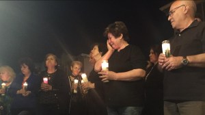 Mourners gathered near the spot Violeta Khachaturyan, 4, was killed on March 6, 2015. (Credit: Kirk Hawkins/KTLA)