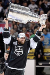 Jarret Stoll of the Los Angeles Kings celebrates with the Stanley Cup after the Kings 3-2 double overtime victory against the New York Rangers in Game Five of the 2014 Stanley Cup Final at Staples Center on June 13, 2014, in Los Angeles, California. (Credit: Harry How/Getty Images)