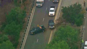 A damaged pickup truck is seen on the Magnolia Boulevard offramp of the 170 Freeway on Monday, April 20, 2015. (Credit: KTLA0