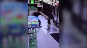 Surveillance video shows a man slapping a boy in a Bakersfield grocery store. (Credit: Facebook)