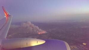 A passenger on a Southwest Airlines flight captured this photo of the Highway Fire on Saturday, April 18, 2015. (Credit: James Storie)