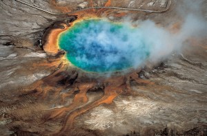 The gorgeous colors of Yellowstone National Park’s Grand Prismatic hot spring are among the park’s myriad hydrothermal features created by a supervolcano – the largest type of volcano on Earth. (Credit: “Windows Into the Earth,” Robert B. Smith and Lee J. Siegel via University of Utah)