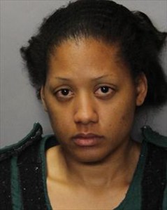 Porche Wright, 27, is seen in a booking photo provided by the Sacramento Police Department. 