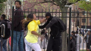 TV station WMAR captured video of a Baltimore mother smacking her son after he allegedly threw rocks at police on April 27, 2015.