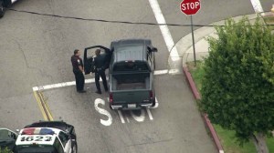 An abandoned black pickup truck was found about a block from where a shooting was reported in Inglewood. (Credit: KTLA)