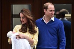 Britain's Prince William, Duke of Cambridge, and his wife Catherine, Duchess of Cambridge show their newly-born daughter, their second child, to the media outside the Lindo Wing at St Mary's Hospital in central London, on Saturday, May 2, 2015. (Credit: Leon Neal/AFP/Getty Images)