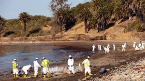 A clean-up operation was underway May 20, 2015, at Refugio State Beach after a ruptured pipeline near Santa Barbara leaked onto the land, beach and ocean. (Credit: Al Seib/Los Angeles Times)