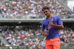 Switzerland's Roger Federer reacts during his match against Colombia's Alejandro Falla during the men's first round at the Roland Garros 2015 French Tennis Open in Paris on Sunday, May 24, 2015. (Credit: Miguel Medina/AFP/Getty Images)