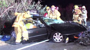 A two-vehicle crash in Laguna Beach on Sunday, May 10, 2015, left one woman dead, two children in critical condition and a man in "extremely critical" condition, police said. (Credit: KTLA)