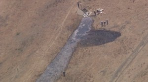 Emergency officials appeared to be working at the on-land spill near Refugio State Beach in Santa Barbara County on May 19, 2015. (Credit: KTLA)
