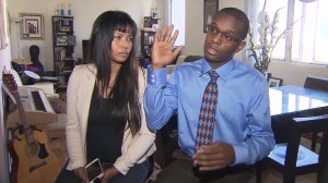 Justin Palmer sits with his wife Christine Gonzales-Palmer as he  on May 11, 2015, describes his arrest by Santa Monica police officers. (Credit: KTLA)