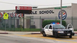 Deputies are seen in front of Rivera Middle School in Pico Rivera on Wednesday, May 27, 2015. (Credit: KTLA)