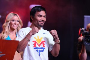 Manny Pacquaio arrives to the cheers of hundreds of fans upon his arrival at Mandalay Bay Resort and Casino on Tuesday, April 28, 2015, in preparation for his May 2 bout with Floyd Mayweather. (Credit: Las Vegas News Bureau)