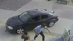 Surveillance video shows a Dodge Avenger driving down the Venice boardwalk on Aug. 3, 2013, as pedestrians try to flee from the vehicle's path.