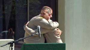 Jorge Castro (Left) and Javier Tiscareno hug during a news conference on Tuesday, June 2, 2015. (Credit: KTLA)