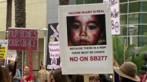 Opponents of SB 277 rally in Sacramento. (Credit: KCRA via CNN)