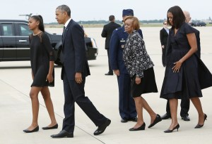 President Barack Obama with first lady Michelle Obama, daughter Sasha and mother-in-law Marian Robinson arrive in Delaware on Saturday, June 6, 2015. (Credit: Yuri Gripas/AFP/Getty Images)