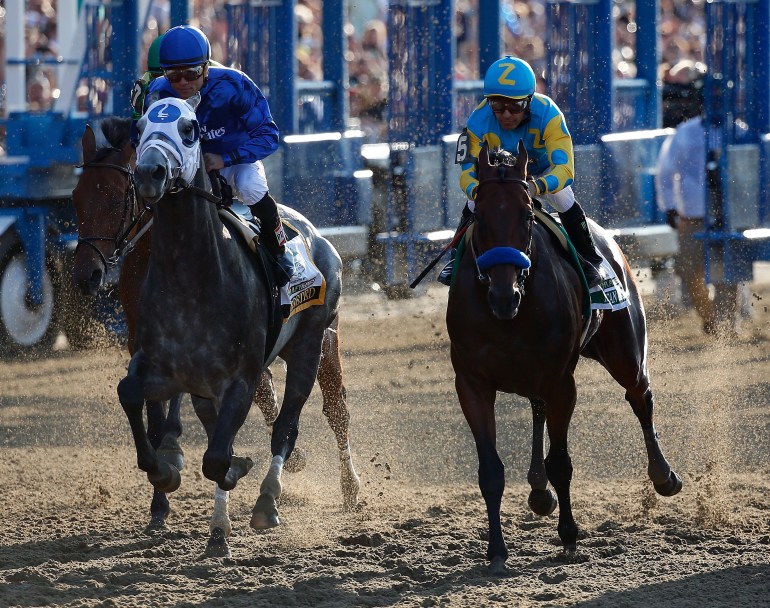 American Pharoah #5, ridden by Victor Espinoza, during the 147th running of the Belmont Stakes at Belmont Park on June 6, 2015, in Elmont, New York. (Credit: Rob Carr/Getty Images)