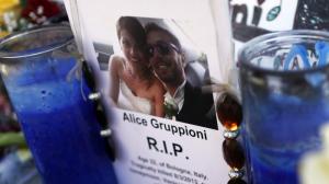 A card bears the photo of Christian Casadei and Alice Gruppioni, who were on their honeymoon when Gruppioni was killed and Casadei injured on Aug. 3, 2013. (Credit: Michael Robinson Chavez / Los Angeles Times)