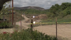 Police were investigating a man's body found at a graded construction area in Irvine on June 5, 2015. (Credit: KTLA)