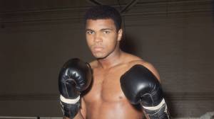 World heavyweight boxing champion Muhammad Ali poses at the Royal Artillery Gymnasium in London while training for a 1966 fight against British champion Henry Cooper. Ali, who compiled a 56-5 professional record, is considered one of the greatest boxers of all-time. (Credit: Trevor Humphries/Getty Images)