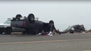A rollover crash prompted CHP to shut down all eastbound lanes of the PCH at Corral Canyon Road on June 13, 2015. (Credit: Mike Cruz) 