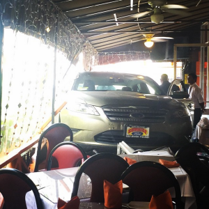 An SUV is seen after driving into East India Grill in Central L.A. on June 28, 2015. (Credit: Brian Suh)