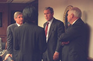 President George W. Bush speaks with Vice President Dick Cheney and members of his senior staff on Tuesday, Sept. 11, 2001.